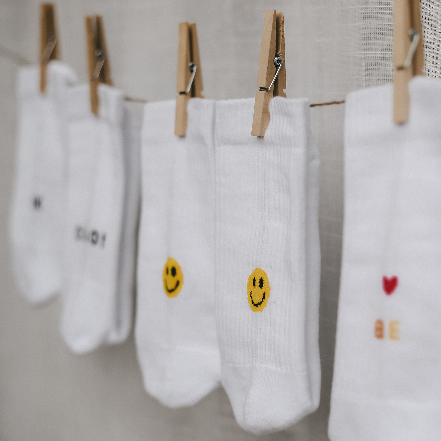 Eulenschnitt Mottosocken Smiley gelb